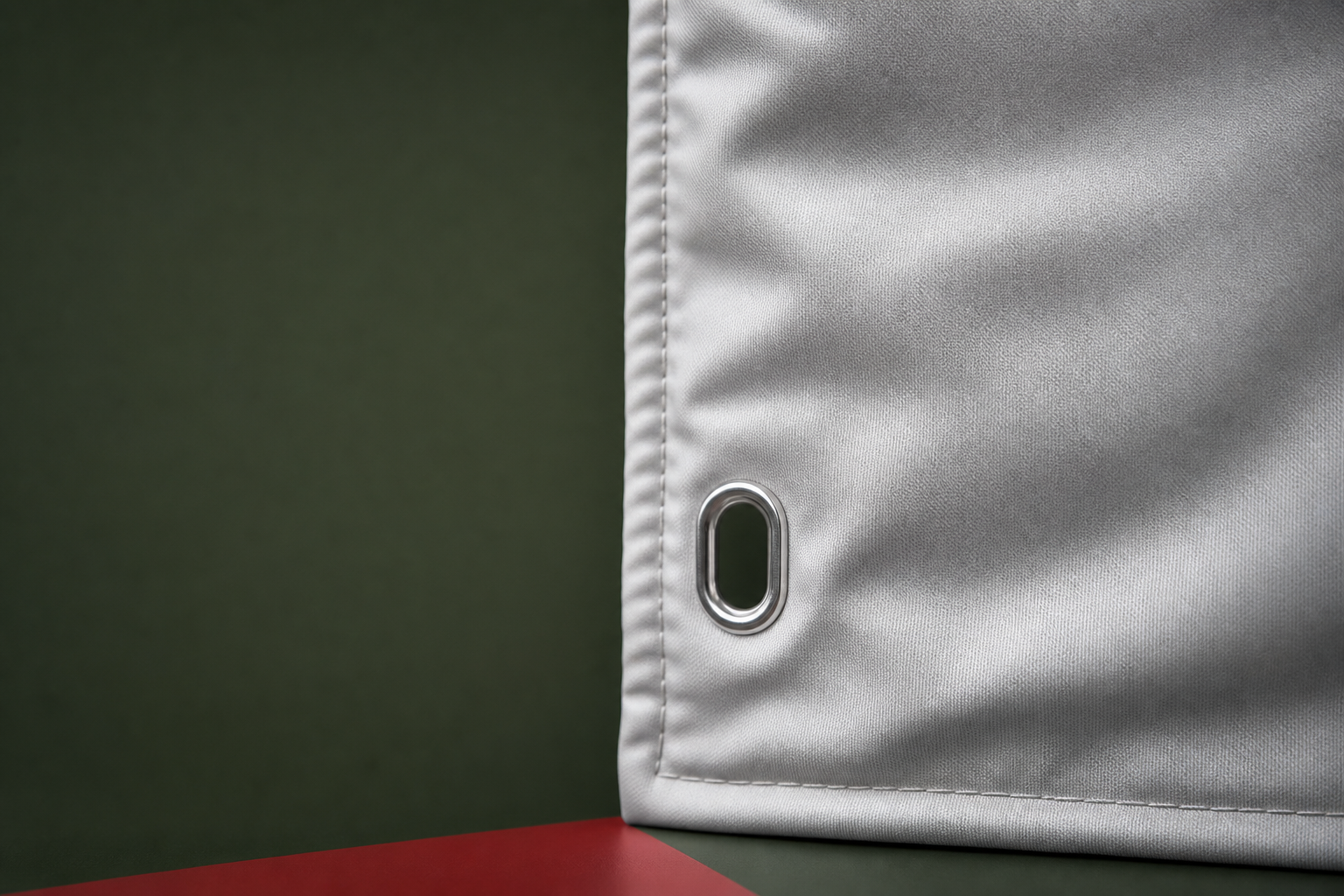 Reinforced blanket edge and metal eyelet concept detail